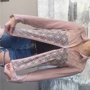 Small pink button up cover shirt